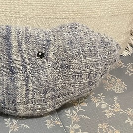 cropped image of a knit whale face